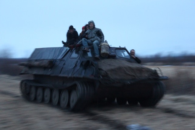 Having some fun with Yuri Dorzdovskii, a 'vezdekhodchik' ('all-terrain-vehicle-man') who regularly supplies the reindeer brigades and villages without road connection.